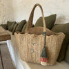 Scallop-edge jute tote bag with an embroidered monogram