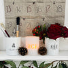 White laser-etched monogrammed scented candles with personalised text and motifs, made from 100% natural vegan soy and coconut wax in a glass candle holder - Initially London